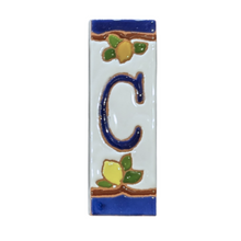 Load image into Gallery viewer, Ceramic house number tile - lemons & oranges with dark blue edge, ceramic relief style