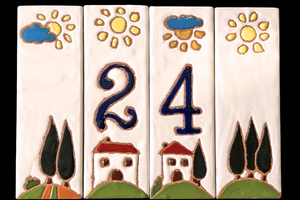 Four ceramic tiles with numbers and decorative elements on a white background made in Italy
